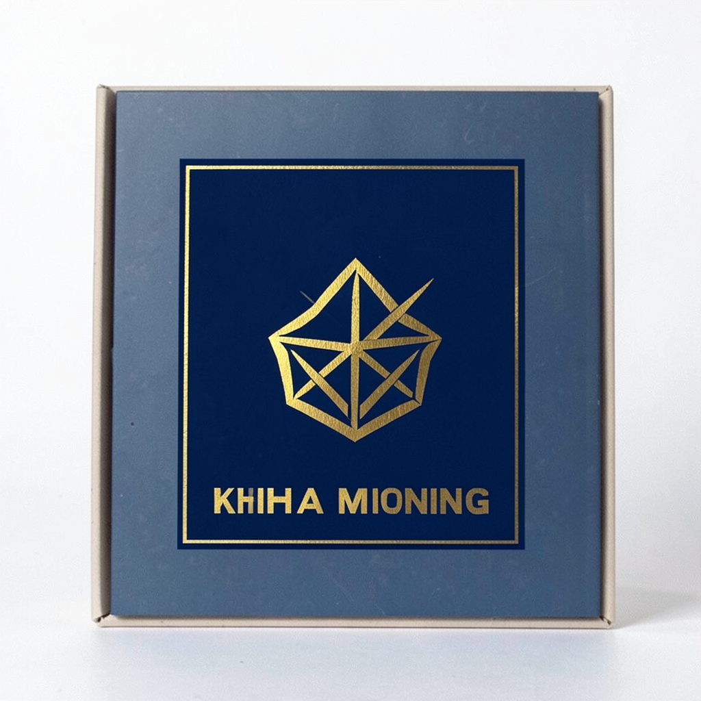 Navy blue square emblem with a gold geometric mining symbol
